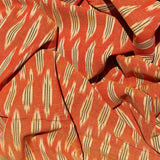 Cotton Ikat Handwoven Fabric: Orange with Cream & Black